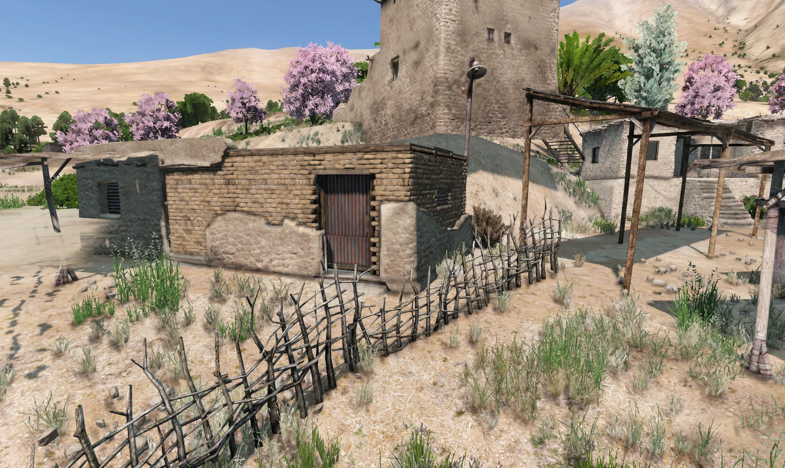 Finished: brick walls, the roof on, a metal door and new windows